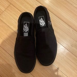 All black Slip on Vans